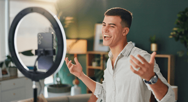 Man recording content with ring light